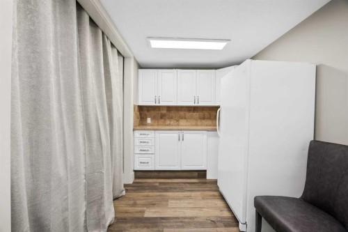 469 Rainbow Falls Way, Chestermere, AB - Indoor Photo Showing Other Room