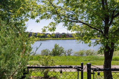 469 Rainbow Falls Way, Chestermere, AB - Outdoor With Body Of Water