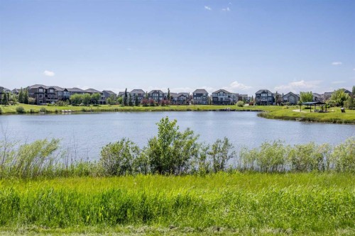 469 Rainbow Falls Way, Chestermere, AB - Outdoor With Body Of Water With View
