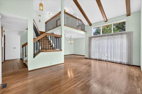 212 Stravanan Bay Sw, Calgary, AB - Indoor Photo Showing Other Room