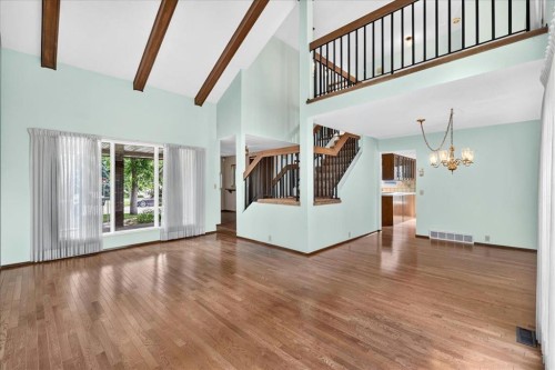 212 Stravanan Bay Sw, Calgary, AB - Indoor Photo Showing Other Room