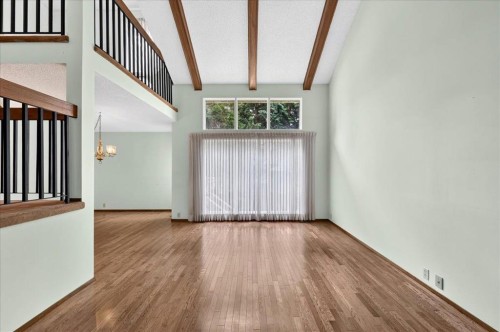 212 Stravanan Bay Sw, Calgary, AB - Indoor Photo Showing Other Room