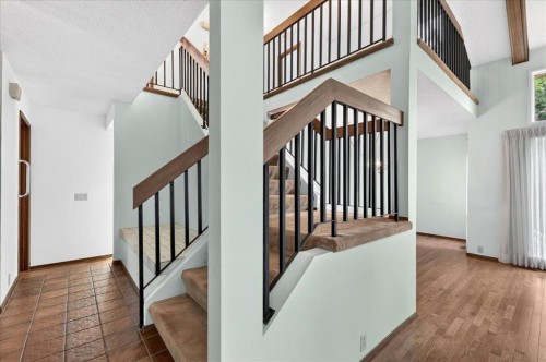 212 Stravanan Bay Sw, Calgary, AB - Indoor Photo Showing Other Room