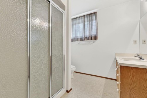 212 Stravanan Bay Sw, Calgary, AB - Indoor Photo Showing Bathroom