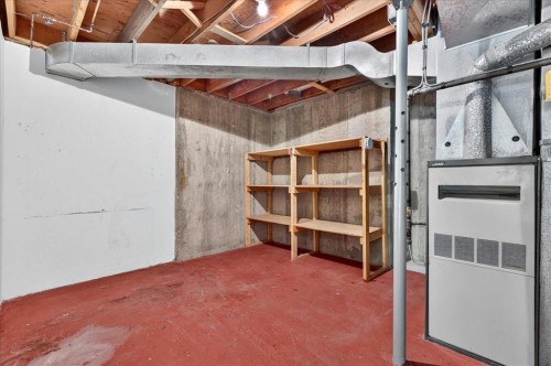 212 Stravanan Bay Sw, Calgary, AB - Indoor Photo Showing Basement