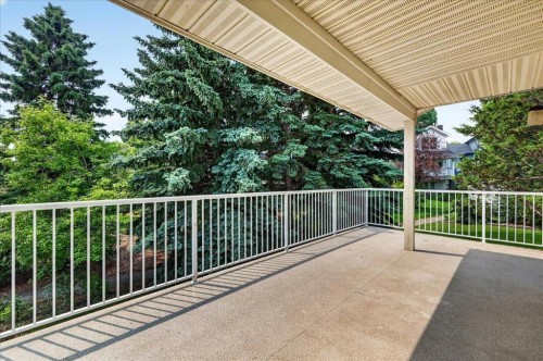 212 Stravanan Bay Sw, Calgary, AB - Outdoor With Deck Patio Veranda With Exterior