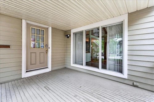212 Stravanan Bay Sw, Calgary, AB - Outdoor With Deck Patio Veranda With Exterior