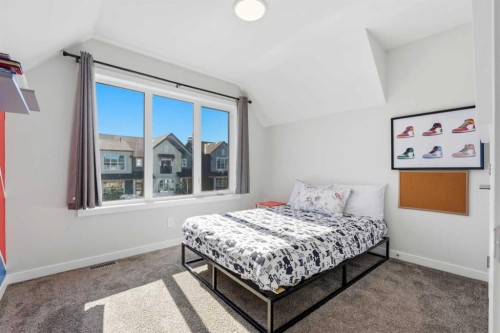 591 Lawthorn Way Se, Airdrie, AB - Indoor Photo Showing Bedroom