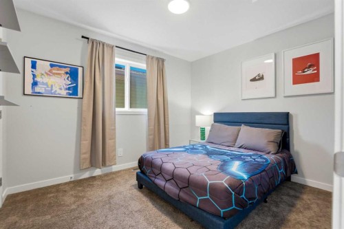 591 Lawthorn Way Se, Airdrie, AB - Indoor Photo Showing Bedroom