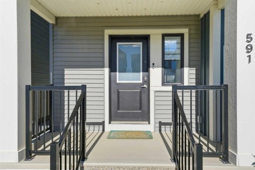 591 Lawthorn Way Se, Airdrie, AB - Outdoor With Deck Patio Veranda With Exterior