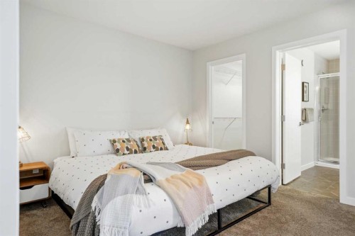 591 Lawthorn Way Se, Airdrie, AB - Indoor Photo Showing Bedroom