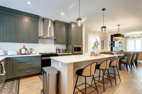 15033 37 Street Sw, Calgary, AB - Indoor Photo Showing Kitchen With Upgraded Kitchen
