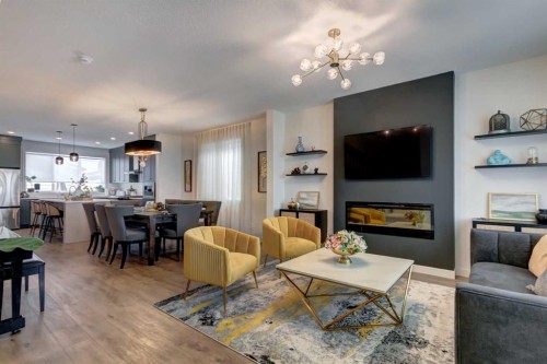 15033 37 Street Sw, Calgary, AB - Indoor Photo Showing Living Room With Fireplace