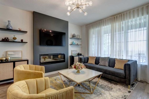 15033 37 Street Sw, Calgary, AB - Indoor Photo Showing Living Room With Fireplace