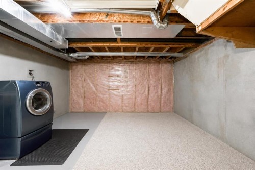 101 Hidden Valley Villas Nw, Calgary, AB - Indoor Photo Showing Basement