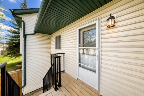101 Hidden Valley Villas Nw, Calgary, AB - Outdoor With Deck Patio Veranda With Exterior