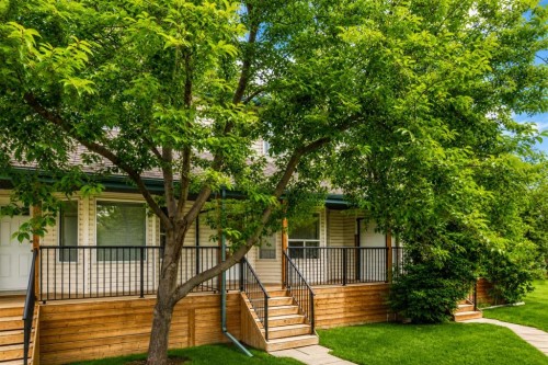 101 Hidden Valley Villas Nw, Calgary, AB - Outdoor With Deck Patio Veranda