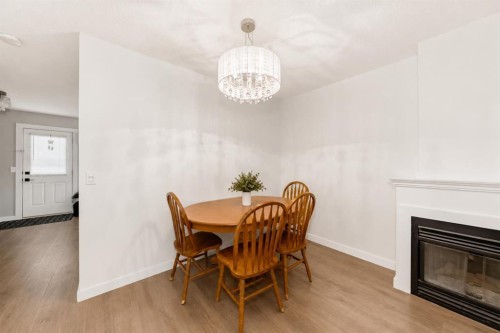 101 Hidden Valley Villas Nw, Calgary, AB - Indoor With Fireplace