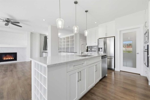 129 Kingsbury Close Se, Airdrie, AB - Indoor Photo Showing Kitchen With Upgraded Kitchen
