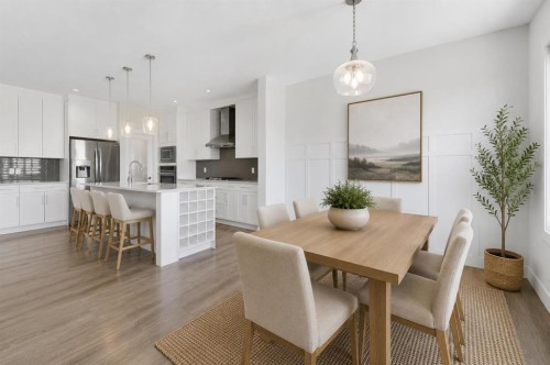 129 Kingsbury Close Se, Airdrie, AB - Indoor Photo Showing Dining Room