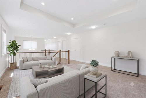 129 Kingsbury Close Se, Airdrie, AB - Indoor Photo Showing Living Room