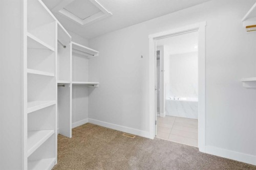 129 Kingsbury Close Se, Airdrie, AB - Indoor With Storage