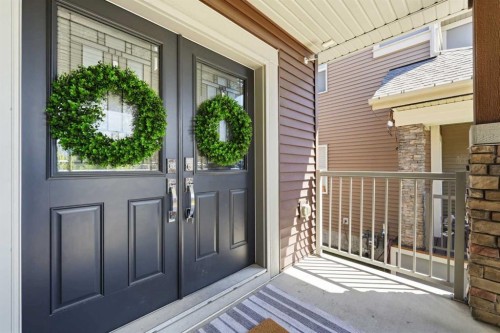 129 Kingsbury Close Se, Airdrie, AB - Outdoor With Deck Patio Veranda With Exterior
