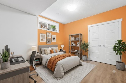 129 Kingsbury Close Se, Airdrie, AB - Indoor Photo Showing Bedroom