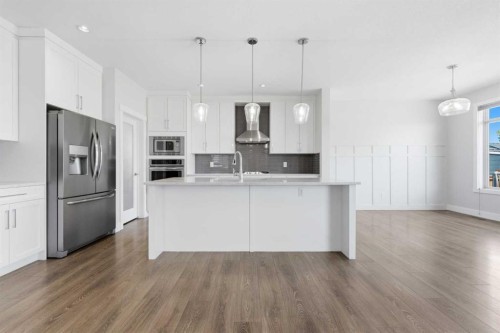 129 Kingsbury Close Se, Airdrie, AB - Indoor Photo Showing Kitchen With Double Sink