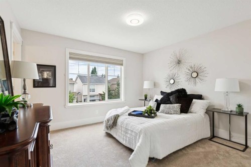 257 Cougartown Circle Sw, Calgary, AB - Indoor Photo Showing Bedroom