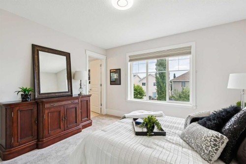 257 Cougartown Circle Sw, Calgary, AB - Indoor Photo Showing Bedroom