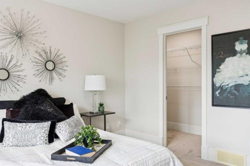 257 Cougartown Circle Sw, Calgary, AB - Indoor Photo Showing Bedroom