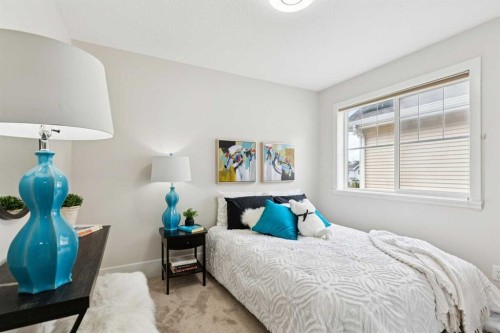 257 Cougartown Circle Sw, Calgary, AB - Indoor Photo Showing Bedroom