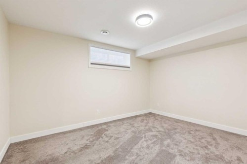 257 Cougartown Circle Sw, Calgary, AB - Indoor Photo Showing Other Room