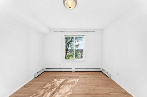 9205-70 Panamount Drive Nw, Calgary, AB - Indoor Photo Showing Other Room