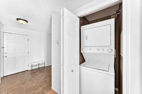 9205-70 Panamount Drive Nw, Calgary, AB - Indoor Photo Showing Laundry Room