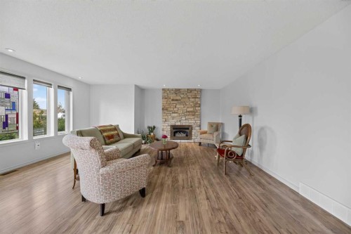 5418 43 Street, Olds, AB - Indoor Photo Showing Living Room With Fireplace
