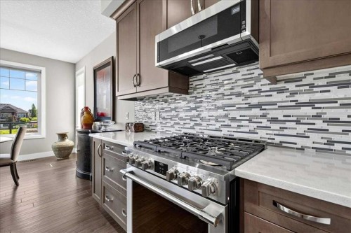 69 Cimarron Springs Circle, Okotoks, AB - Indoor Photo Showing Kitchen With Upgraded Kitchen