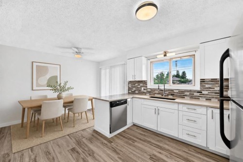 2016 46 Street Se, Calgary, AB - Indoor Photo Showing Kitchen With Upgraded Kitchen