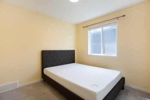 112 Lucas Street Nw, Calgary, AB - Indoor Photo Showing Bedroom