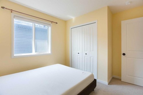 112 Lucas Street Nw, Calgary, AB - Indoor Photo Showing Bedroom