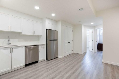 112 Lucas Street Nw, Calgary, AB - Indoor Photo Showing Kitchen With Stainless Steel Kitchen
