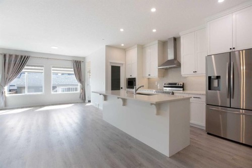 112 Lucas Street Nw, Calgary, AB - Indoor Photo Showing Kitchen With Stainless Steel Kitchen With Upgraded Kitchen