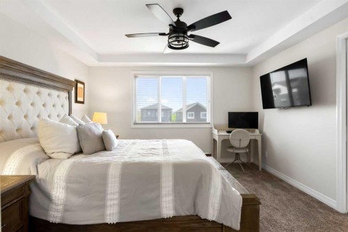 31 Magnolia Grove Se, Calgary, AB - Indoor Photo Showing Bedroom