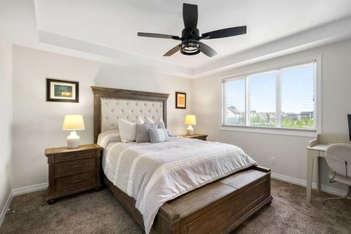 31 Magnolia Grove Se, Calgary, AB - Indoor Photo Showing Bedroom