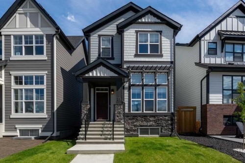 31 Magnolia Grove Se, Calgary, AB - Outdoor With Facade