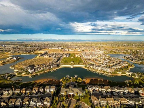 31 Magnolia Grove Se, Calgary, AB - Outdoor With Body Of Water With View