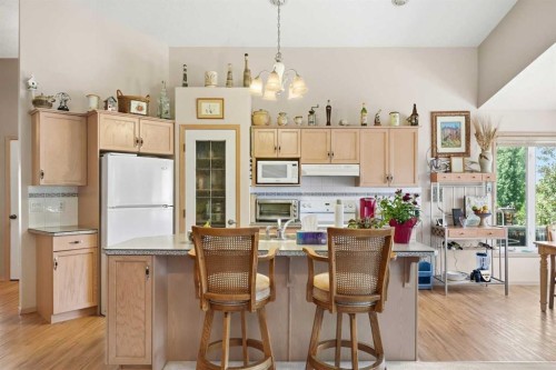 164 Sunterra Heights, Cochrane, AB - Indoor Photo Showing Kitchen
