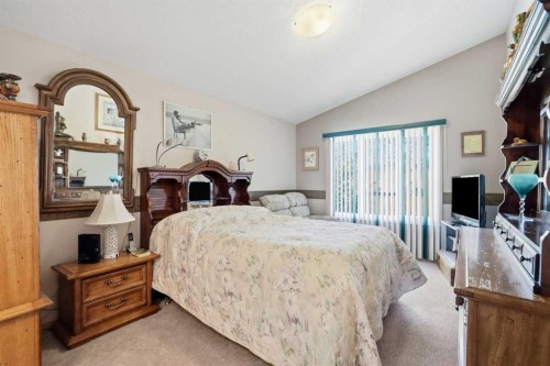 164 Sunterra Heights, Cochrane, AB - Indoor Photo Showing Bedroom