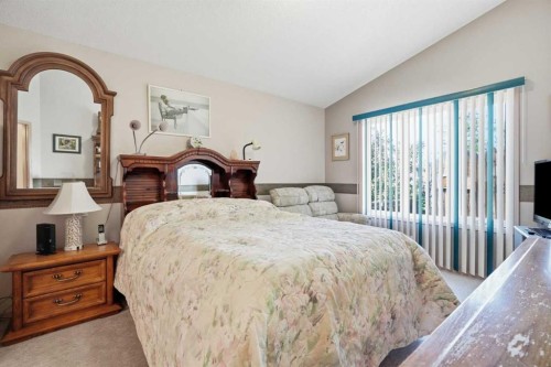 164 Sunterra Heights, Cochrane, AB - Indoor Photo Showing Bedroom